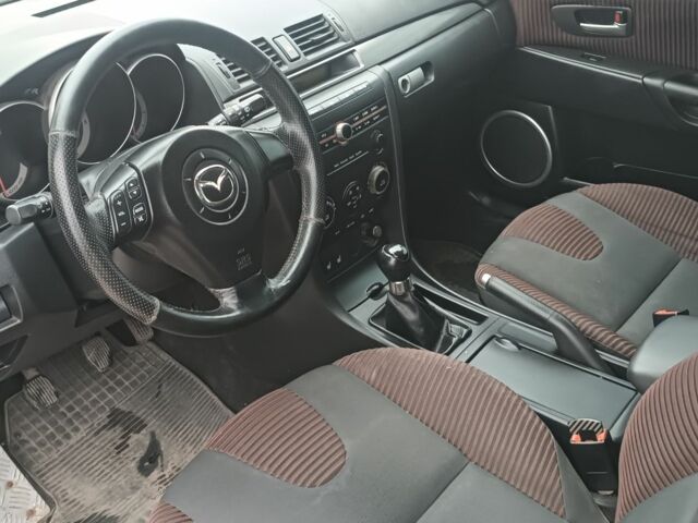 Жовтий Мазда 3 МПС, об'ємом двигуна 2 л та пробігом 230 тис. км за 3300 $, фото 6 на Automoto.ua