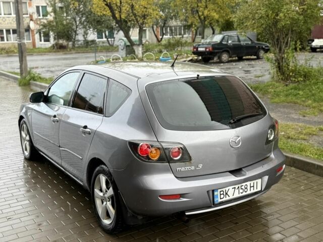 Серый Мазда 3 МПС, объемом двигателя 1.6 л и пробегом 350 тыс. км за 3000 $, фото 5 на Automoto.ua