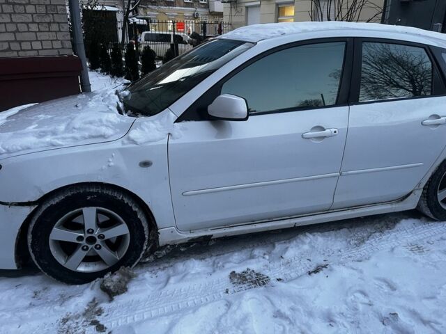 Белый Мазда 3, объемом двигателя 1.6 л и пробегом 320 тыс. км за 3300 $, фото 2 на Automoto.ua