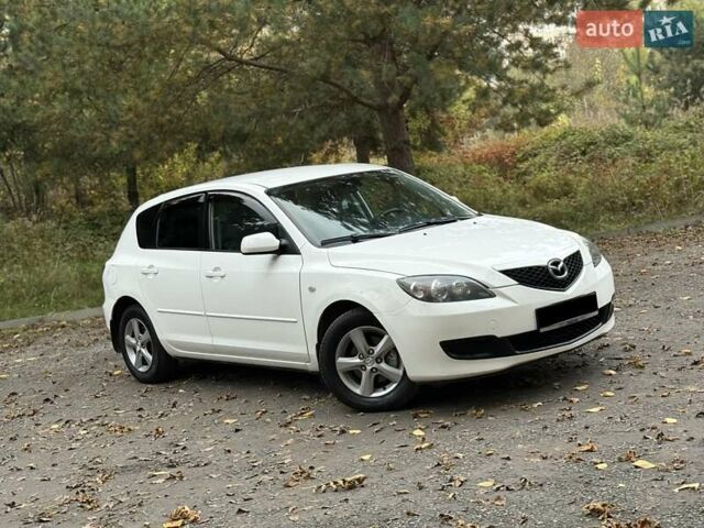 Белый Мазда 3, объемом двигателя 1.59 л и пробегом 305 тыс. км за 4900 $, фото 7 на Automoto.ua