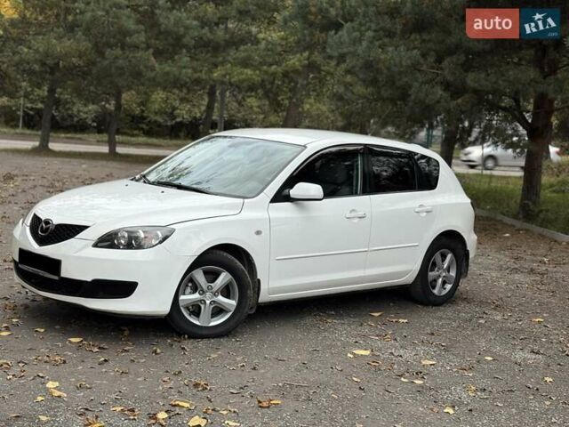 Белый Мазда 3, объемом двигателя 1.59 л и пробегом 305 тыс. км за 4900 $, фото 21 на Automoto.ua