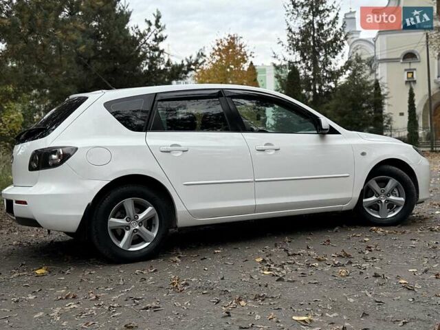 Белый Мазда 3, объемом двигателя 1.59 л и пробегом 305 тыс. км за 4900 $, фото 11 на Automoto.ua