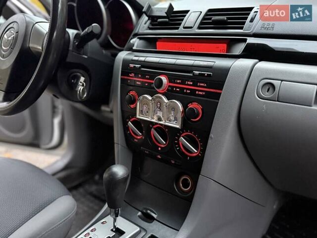 Белый Мазда 3, объемом двигателя 1.59 л и пробегом 305 тыс. км за 4900 $, фото 70 на Automoto.ua