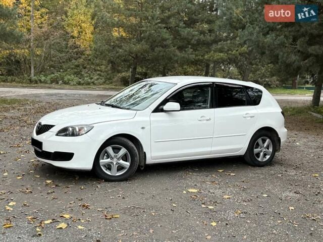 Белый Мазда 3, объемом двигателя 1.59 л и пробегом 305 тыс. км за 4900 $, фото 24 на Automoto.ua