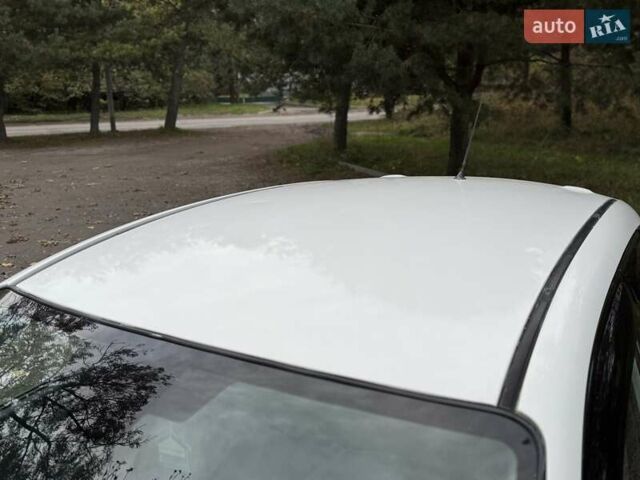 Белый Мазда 3, объемом двигателя 1.59 л и пробегом 305 тыс. км за 4900 $, фото 31 на Automoto.ua
