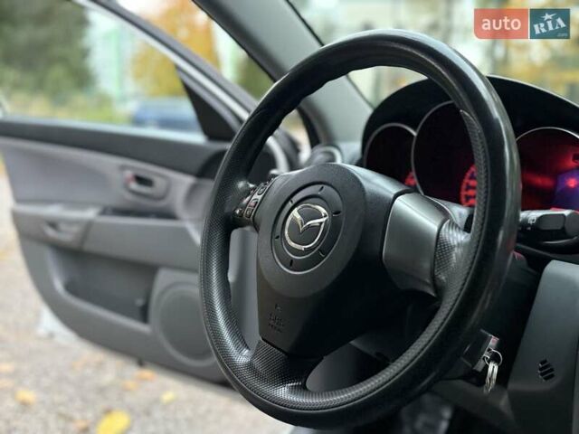 Белый Мазда 3, объемом двигателя 1.59 л и пробегом 305 тыс. км за 4900 $, фото 75 на Automoto.ua
