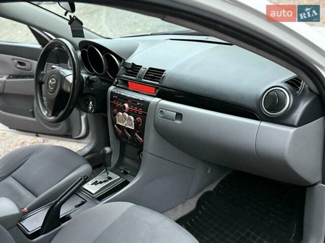 Белый Мазда 3, объемом двигателя 1.59 л и пробегом 305 тыс. км за 4900 $, фото 71 на Automoto.ua