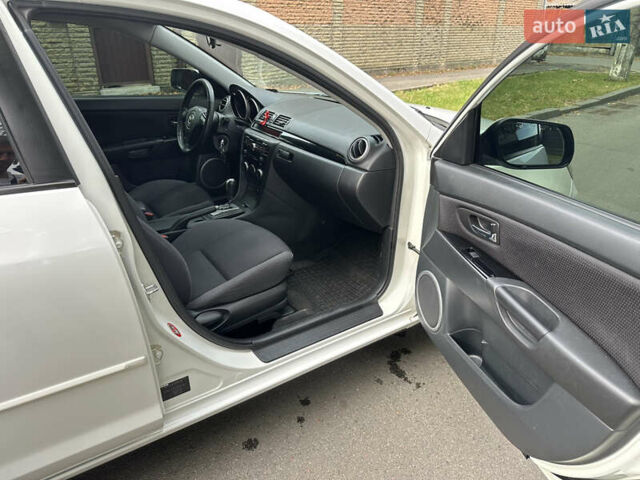 Білий Мазда 3, об'ємом двигуна 1.6 л та пробігом 219 тис. км за 5500 $, фото 20 на Automoto.ua