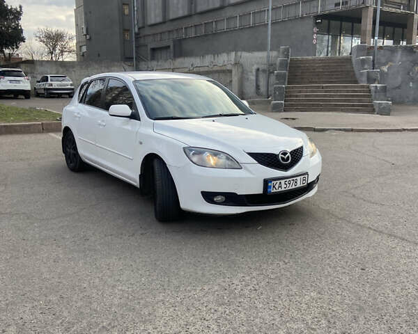 Белый Мазда 3, объемом двигателя 1.6 л и пробегом 223 тыс. км за 4500 $, фото 5 на Automoto.ua