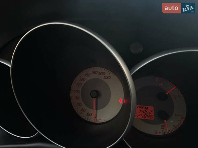 Білий Мазда 3, об'ємом двигуна 1.6 л та пробігом 226 тис. км за 5299 $, фото 9 на Automoto.ua