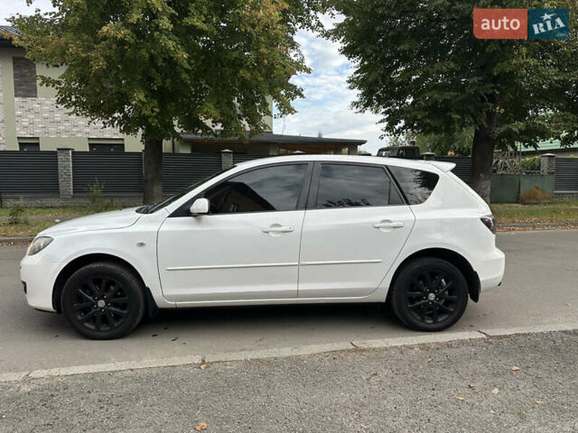 Білий Мазда 3, об'ємом двигуна 1.6 л та пробігом 219 тис. км за 5500 $, фото 11 на Automoto.ua