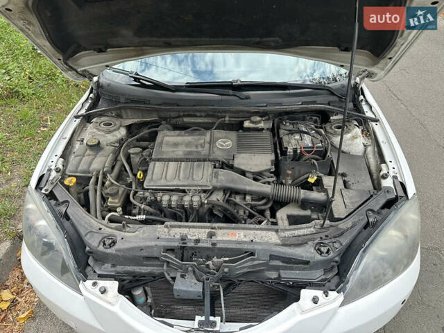 Білий Мазда 3, об'ємом двигуна 1.6 л та пробігом 219 тис. км за 5500 $, фото 45 на Automoto.ua