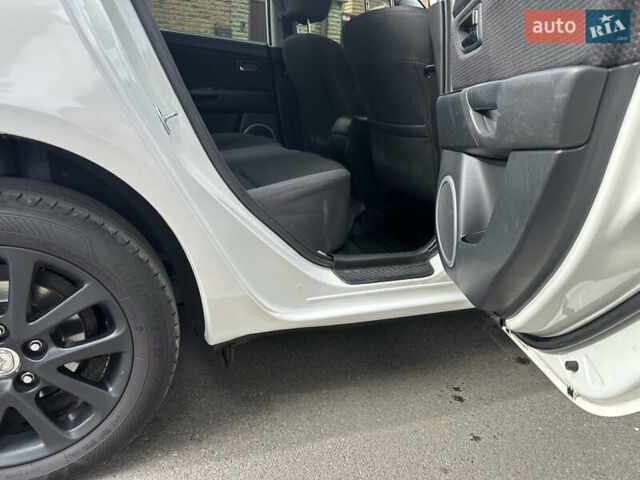 Білий Мазда 3, об'ємом двигуна 1.6 л та пробігом 219 тис. км за 5500 $, фото 18 на Automoto.ua