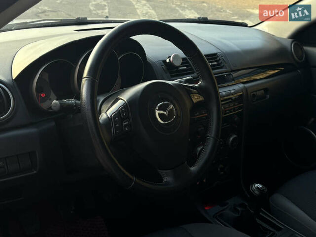 Білий Мазда 3, об'ємом двигуна 1.6 л та пробігом 226 тис. км за 5299 $, фото 7 на Automoto.ua