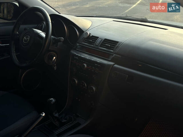 Білий Мазда 3, об'ємом двигуна 1.6 л та пробігом 226 тис. км за 5299 $, фото 14 на Automoto.ua