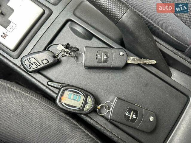 Білий Мазда 3, об'ємом двигуна 1.6 л та пробігом 219 тис. км за 5500 $, фото 37 на Automoto.ua