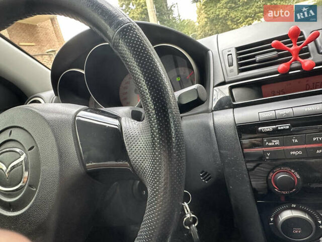 Білий Мазда 3, об'ємом двигуна 1.6 л та пробігом 219 тис. км за 5500 $, фото 27 на Automoto.ua