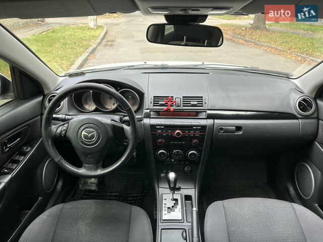 Білий Мазда 3, об'ємом двигуна 1.6 л та пробігом 219 тис. км за 5500 $, фото 23 на Automoto.ua