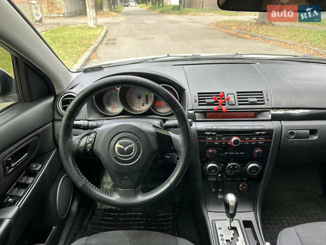 Білий Мазда 3, об'ємом двигуна 1.6 л та пробігом 219 тис. км за 5500 $, фото 24 на Automoto.ua