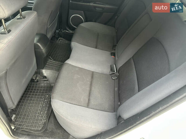 Білий Мазда 3, об'ємом двигуна 1.6 л та пробігом 219 тис. км за 5500 $, фото 39 на Automoto.ua