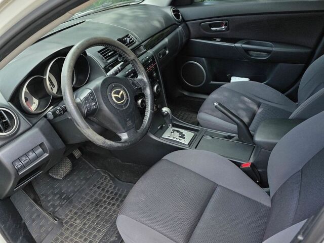 Білий Мазда 3, об'ємом двигуна 2 л та пробігом 230 тис. км за 5654 $, фото 2 на Automoto.ua