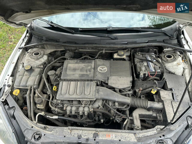 Білий Мазда 3, об'ємом двигуна 1.6 л та пробігом 219 тис. км за 5500 $, фото 46 на Automoto.ua
