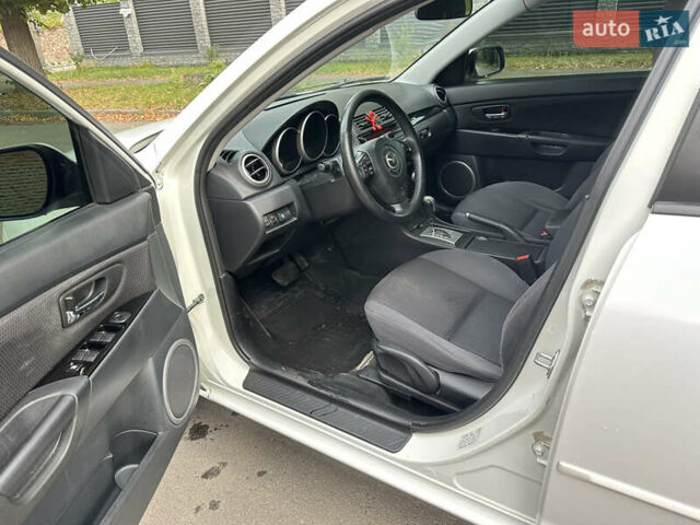 Білий Мазда 3, об'ємом двигуна 1.6 л та пробігом 219 тис. км за 5500 $, фото 19 на Automoto.ua