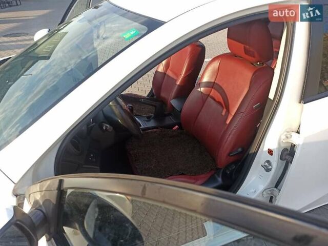 Белый Мазда 3, объемом двигателя 1.56 л и пробегом 230 тыс. км за 6500 $, фото 12 на Automoto.ua