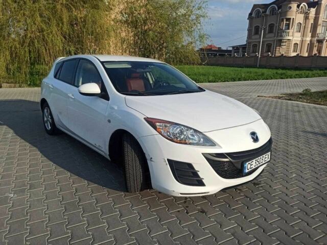 Белый Мазда 3, объемом двигателя 1.6 л и пробегом 230 тыс. км за 5900 $, фото 1 на Automoto.ua