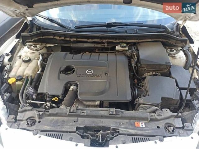 Белый Мазда 3, объемом двигателя 1.56 л и пробегом 230 тыс. км за 6500 $, фото 30 на Automoto.ua