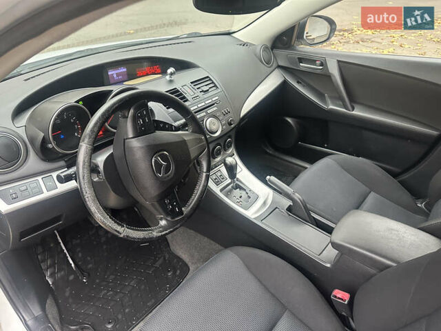 Белый Мазда 3, объемом двигателя 1.6 л и пробегом 130 тыс. км за 7200 $, фото 7 на Automoto.ua