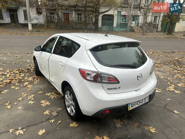 Белый Мазда 3, объемом двигателя 1.6 л и пробегом 130 тыс. км за 7200 $, фото 1 на Automoto.ua