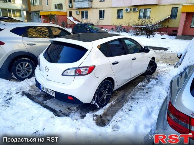 Белый Мазда 3, объемом двигателя 1.6 л и пробегом 230 тыс. км за 8000 $, фото 4 на Automoto.ua