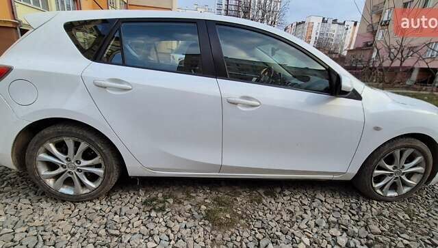 Білий Мазда 3, об'ємом двигуна 1.56 л та пробігом 234 тис. км за 7300 $, фото 1 на Automoto.ua
