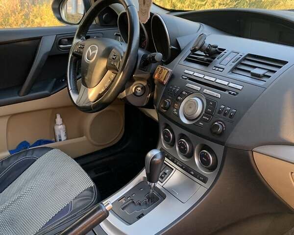 Білий Мазда 3, об'ємом двигуна 1.6 л та пробігом 95 тис. км за 9500 $, фото 9 на Automoto.ua