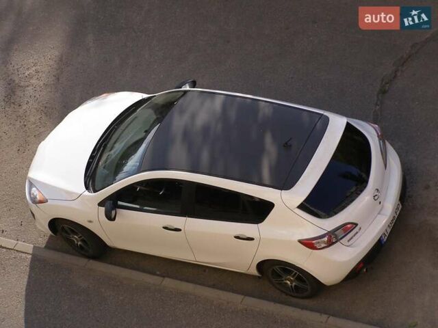 Білий Мазда 3, об'ємом двигуна 1.6 л та пробігом 230 тис. км за 7200 $, фото 4 на Automoto.ua