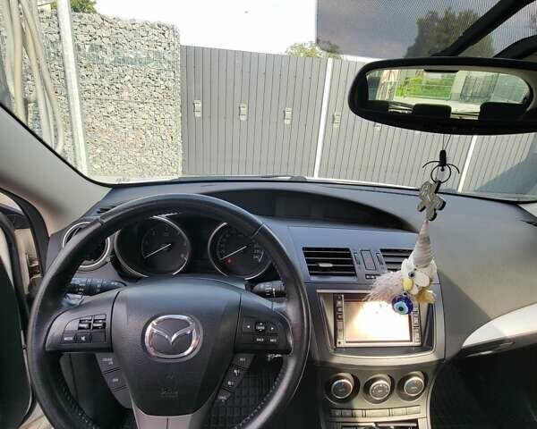 Білий Мазда 3, об'ємом двигуна 1.56 л та пробігом 228 тис. км за 7700 $, фото 19 на Automoto.ua