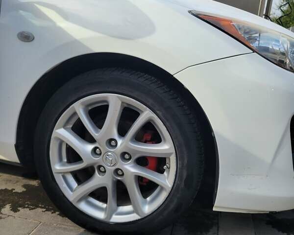 Білий Мазда 3, об'ємом двигуна 1.56 л та пробігом 228 тис. км за 7700 $, фото 4 на Automoto.ua