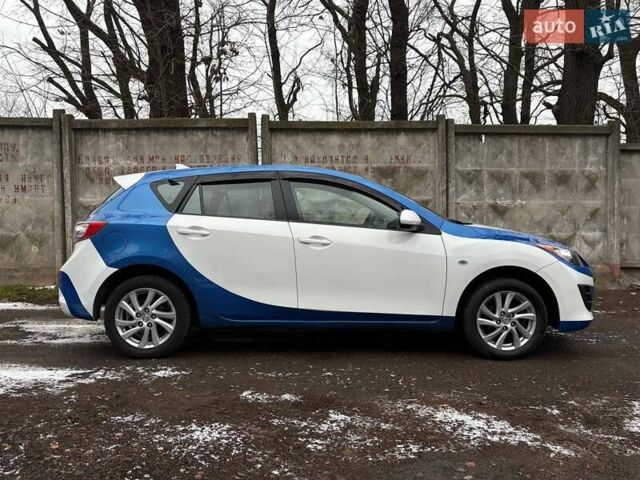 Білий Мазда 3, об'ємом двигуна 1.6 л та пробігом 151 тис. км за 6850 $, фото 14 на Automoto.ua