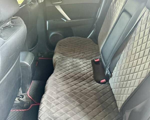 Білий Мазда 3, об'ємом двигуна 1.56 л та пробігом 227 тис. км за 7900 $, фото 13 на Automoto.ua