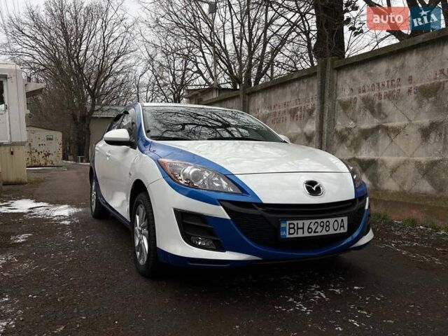 Білий Мазда 3, об'ємом двигуна 1.6 л та пробігом 151 тис. км за 6850 $, фото 3 на Automoto.ua
