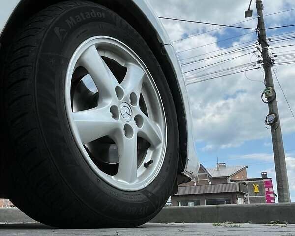Білий Мазда 3, об'ємом двигуна 1.6 л та пробігом 198 тис. км за 7300 $, фото 13 на Automoto.ua
