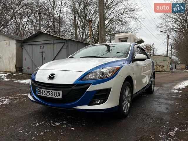 Білий Мазда 3, об'ємом двигуна 1.6 л та пробігом 151 тис. км за 6850 $, фото 1 на Automoto.ua