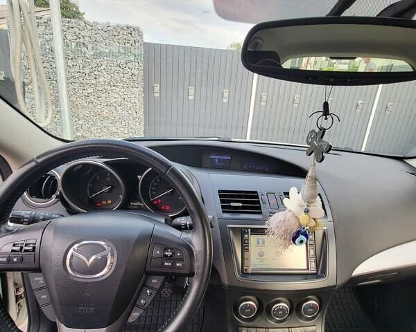 Білий Мазда 3, об'ємом двигуна 1.56 л та пробігом 228 тис. км за 7700 $, фото 23 на Automoto.ua