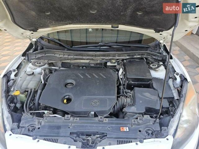 Білий Мазда 3, об'ємом двигуна 1.56 л та пробігом 227 тис. км за 7900 $, фото 4 на Automoto.ua