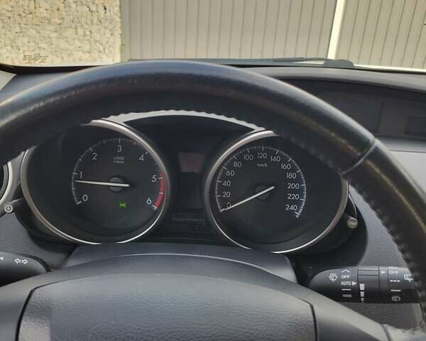 Білий Мазда 3, об'ємом двигуна 1.56 л та пробігом 228 тис. км за 7700 $, фото 30 на Automoto.ua