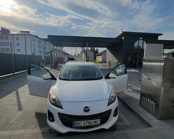 Білий Мазда 3, об'ємом двигуна 1.56 л та пробігом 228 тис. км за 7700 $, фото 3 на Automoto.ua