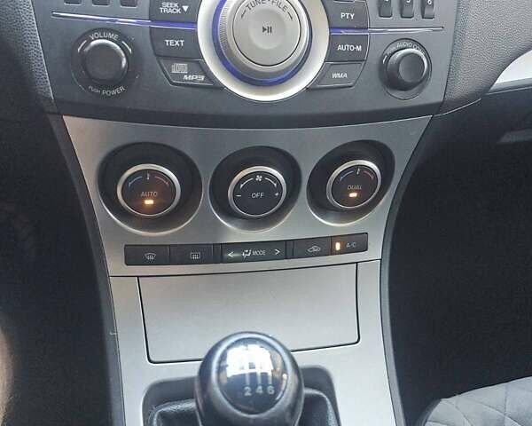 Білий Мазда 3, об'ємом двигуна 1.56 л та пробігом 227 тис. км за 7900 $, фото 6 на Automoto.ua
