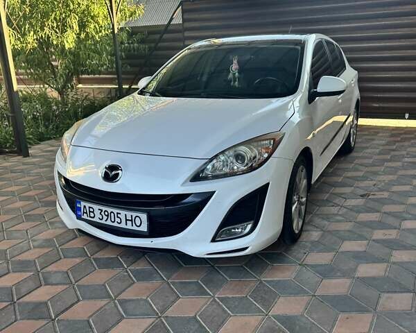 Білий Мазда 3, об'ємом двигуна 1.56 л та пробігом 227 тис. км за 7900 $, фото 1 на Automoto.ua