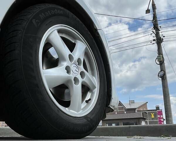 Білий Мазда 3, об'ємом двигуна 1.6 л та пробігом 201 тис. км за 7200 $, фото 4 на Automoto.ua